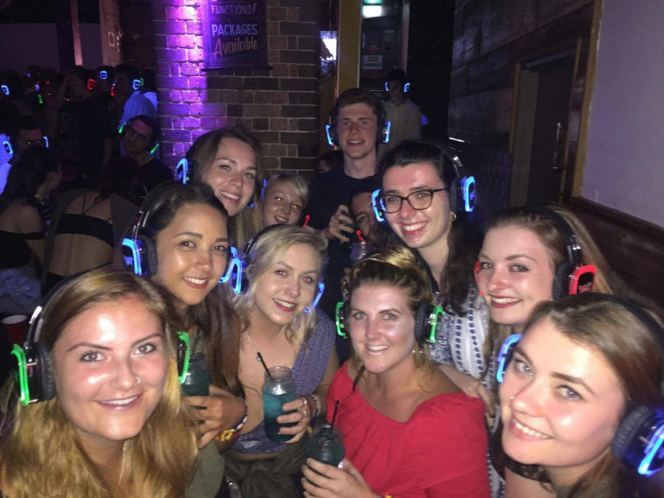 Group of people at a silent disco party.