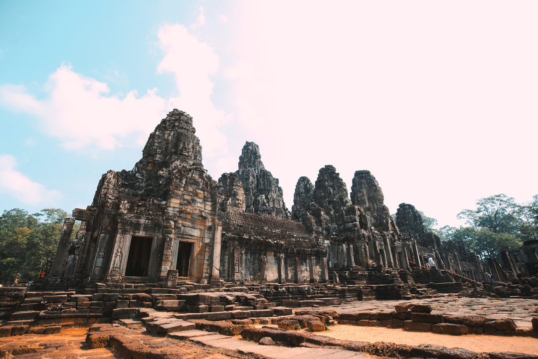 Ruins of an ancient temple under a clear sky.