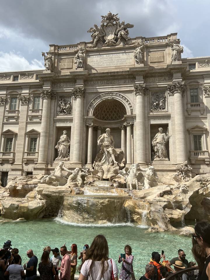 Tourists near the Trevi Fountain.