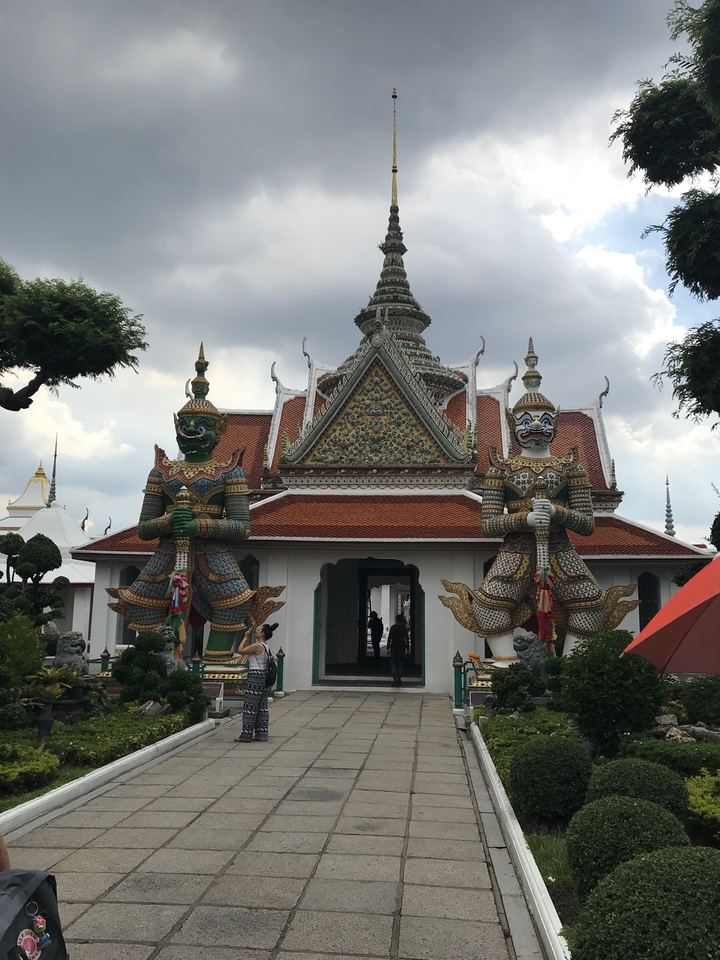 Intricately decorated temple entrance with statues.