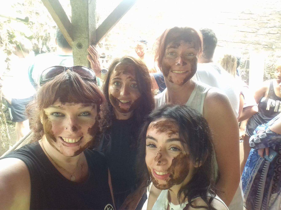 Group of people with painted faces.