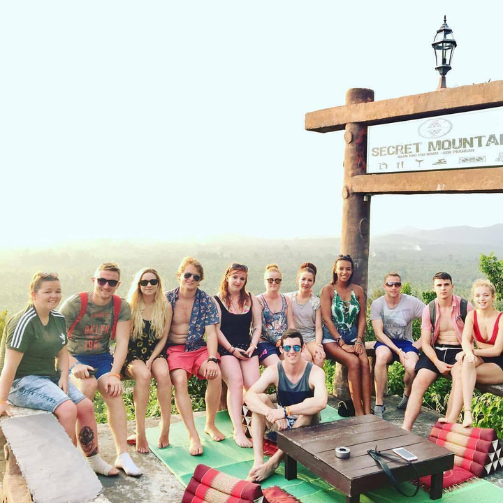 Group of tourists at Secret Mountain viewpoint.