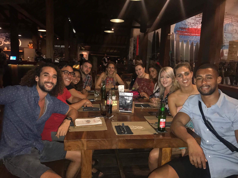 Group of people dining together in a restaurant.