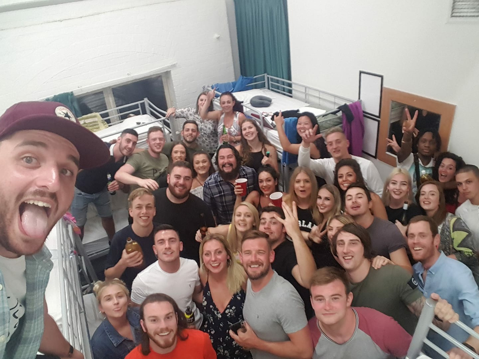 Large group indoors at a gathering or party.