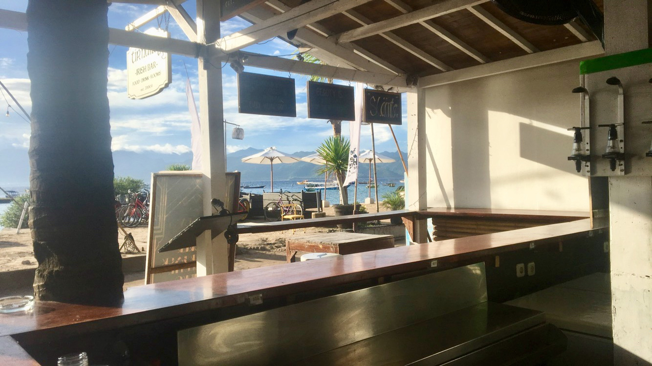 Beachside bar with ocean view.