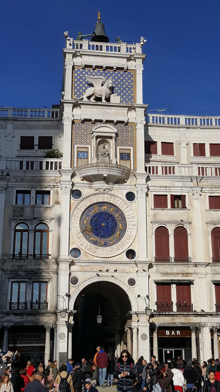 Clock tower with zodiac motifs in Venice.
