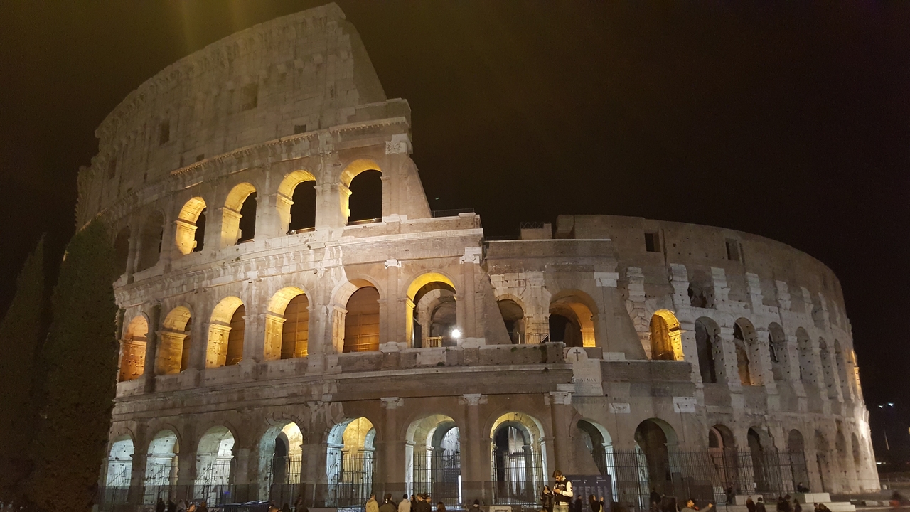 Illuminated Colosseum at night