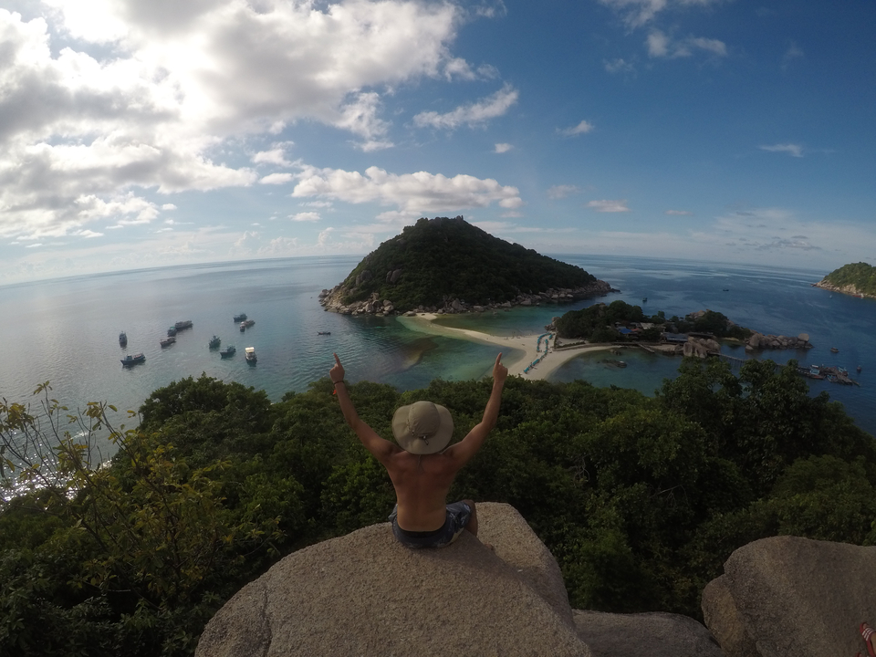 Dramatic viewpoint overlooking a picturesque island landscape.