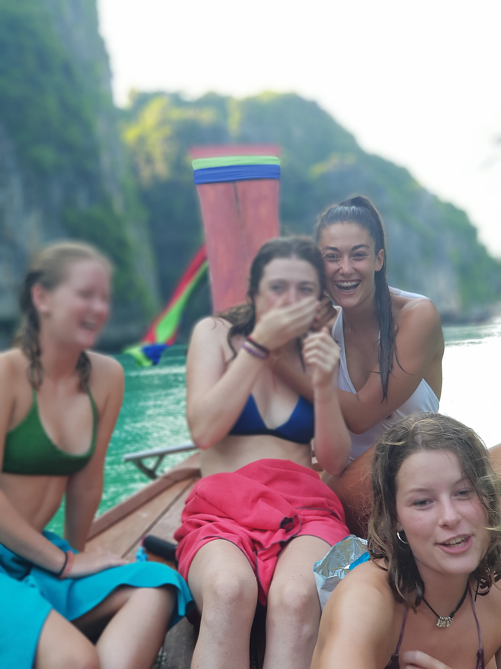Group of women laughing and enjoying together.