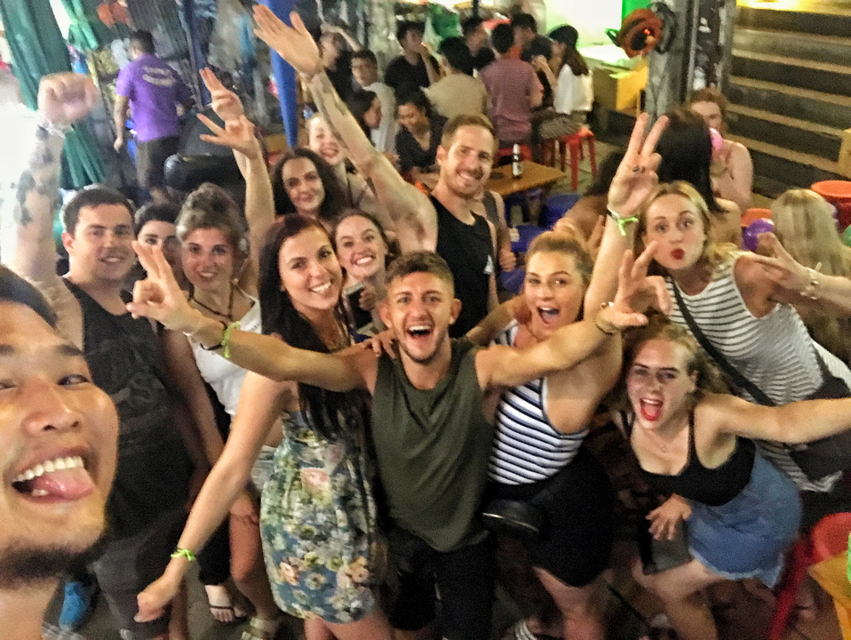 Group of friends having fun in a lively party setting.