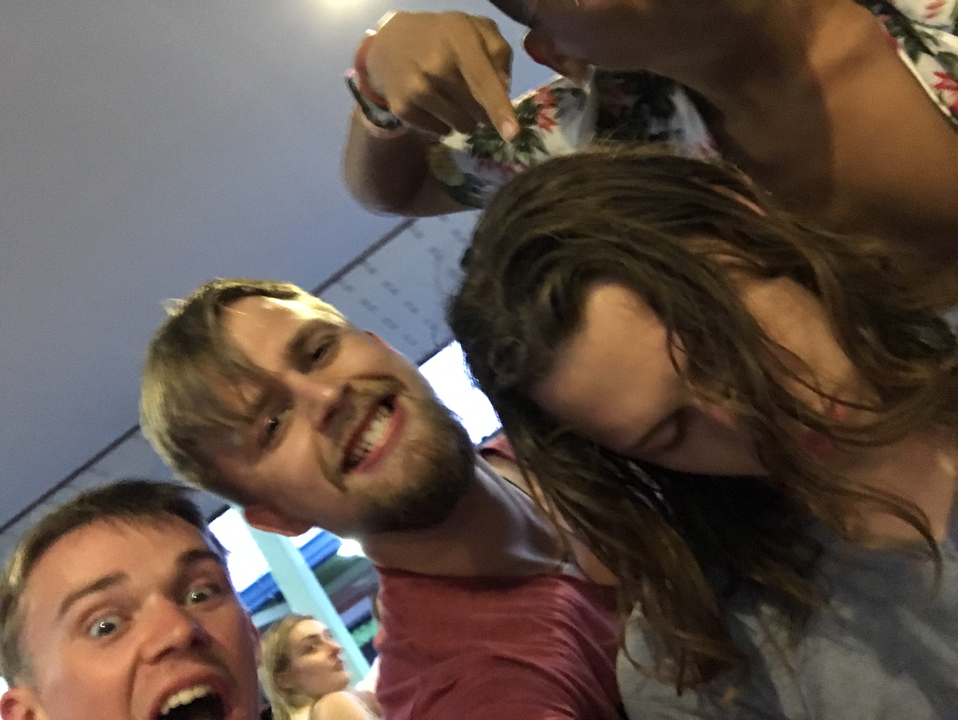 Group of friends enjoying themselves indoors.