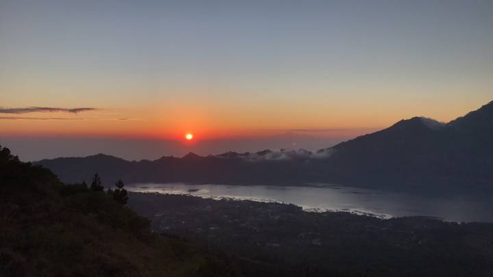 Sunset over a mountain landscape.