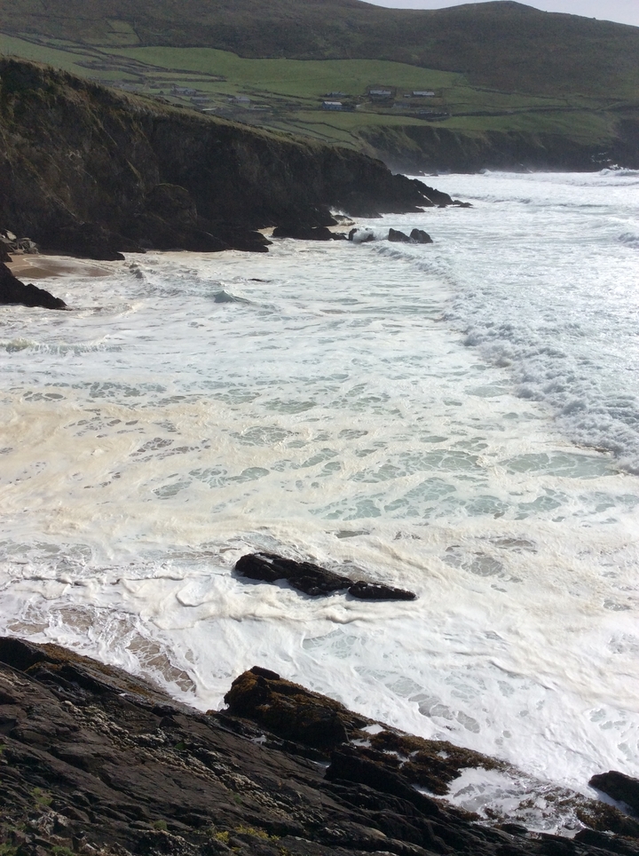 Close-up of ocean waves and foam.