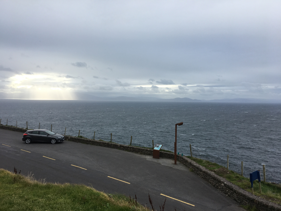Panoramic view of a coastal road and sea