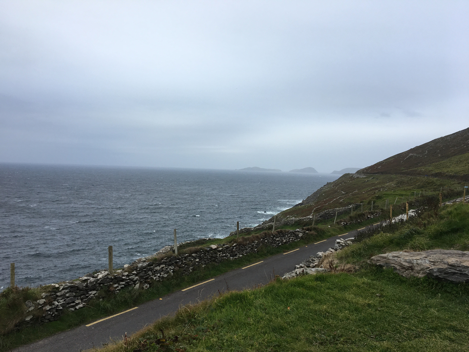 Scenic coastal view with rolling hills and ocean