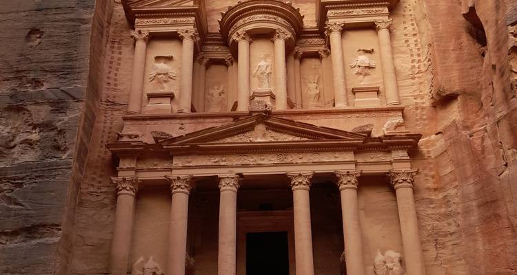 The iconic Petra Treasury carved into sandstone rock.