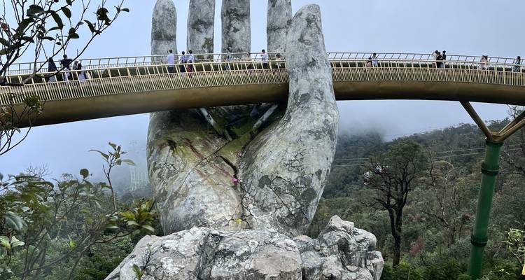 Golden Bridge with giant hand sculpture