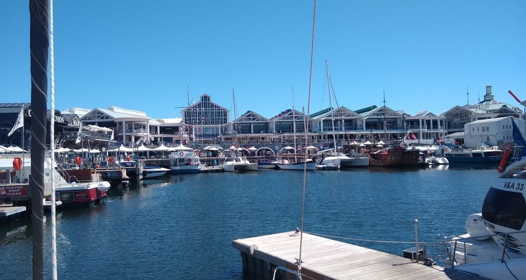 Harbor with boats and buildings in the background.