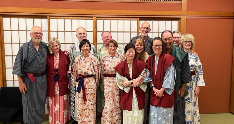Group wearing traditional Japanese attire indoors.