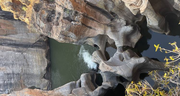 Rock formations with water flowing through them.