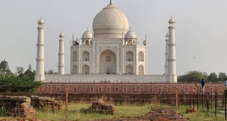 The iconic Taj Mahal with gardens in front.