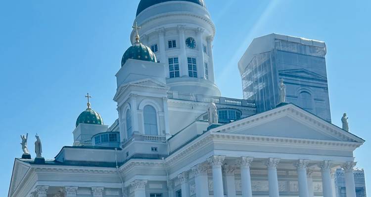 Helsinki Cathedral against a clear blue sky.