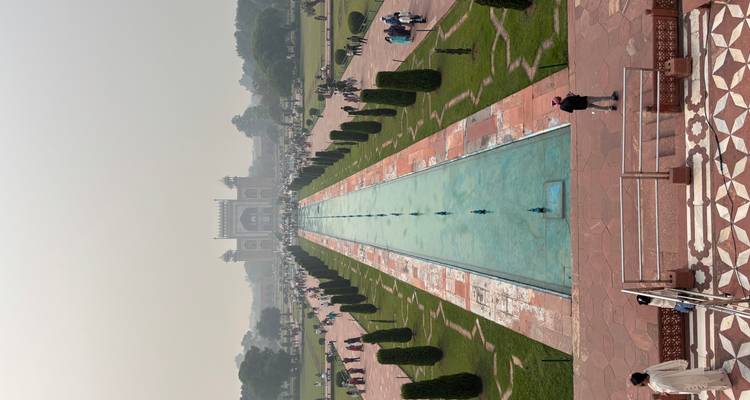 Reflective pool leading to a grand entrance.