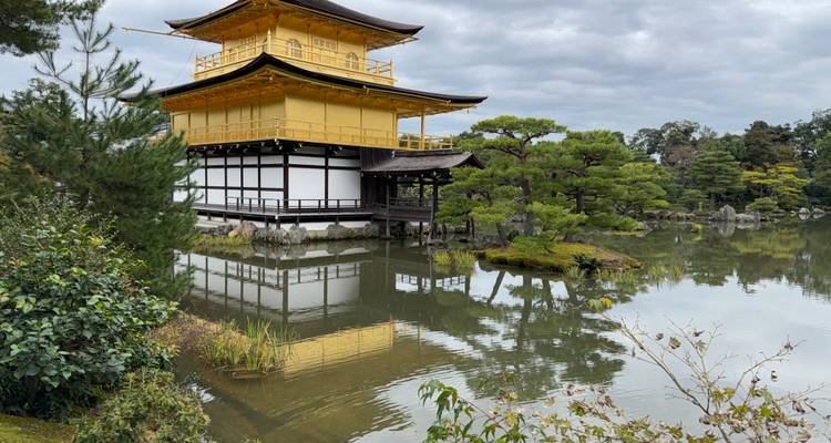 Golden Pavilion with reflection in the water in Kyoto.