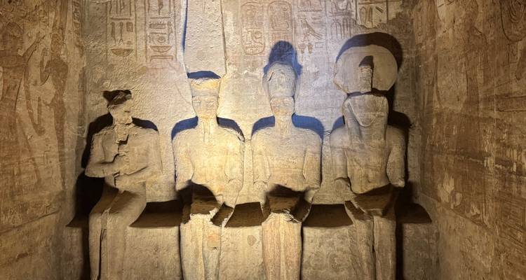 Interior view of a cave with ancient engravings.