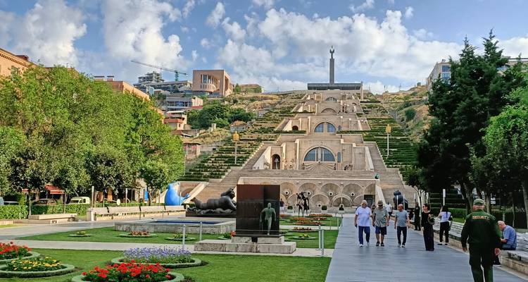 Yerevan Cascade steps and sculptures leading up a hill on a sunny day