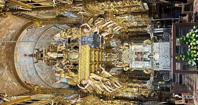 Opulent gilded baroque altar and nave inside Santiago de Compostela Cathedral.