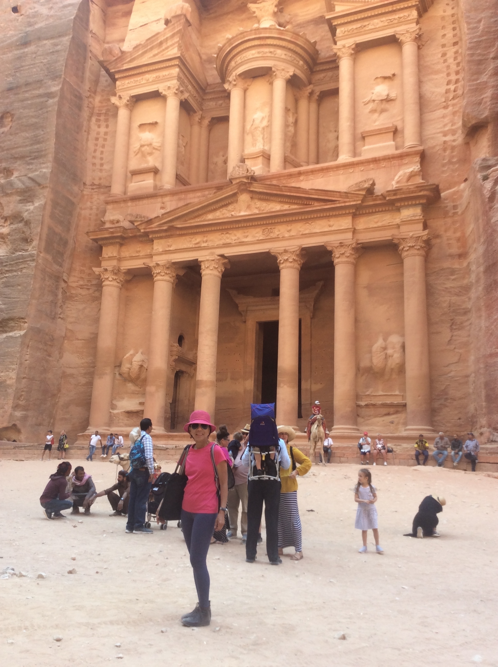 Tourists visiting the iconic Petra Treasury.