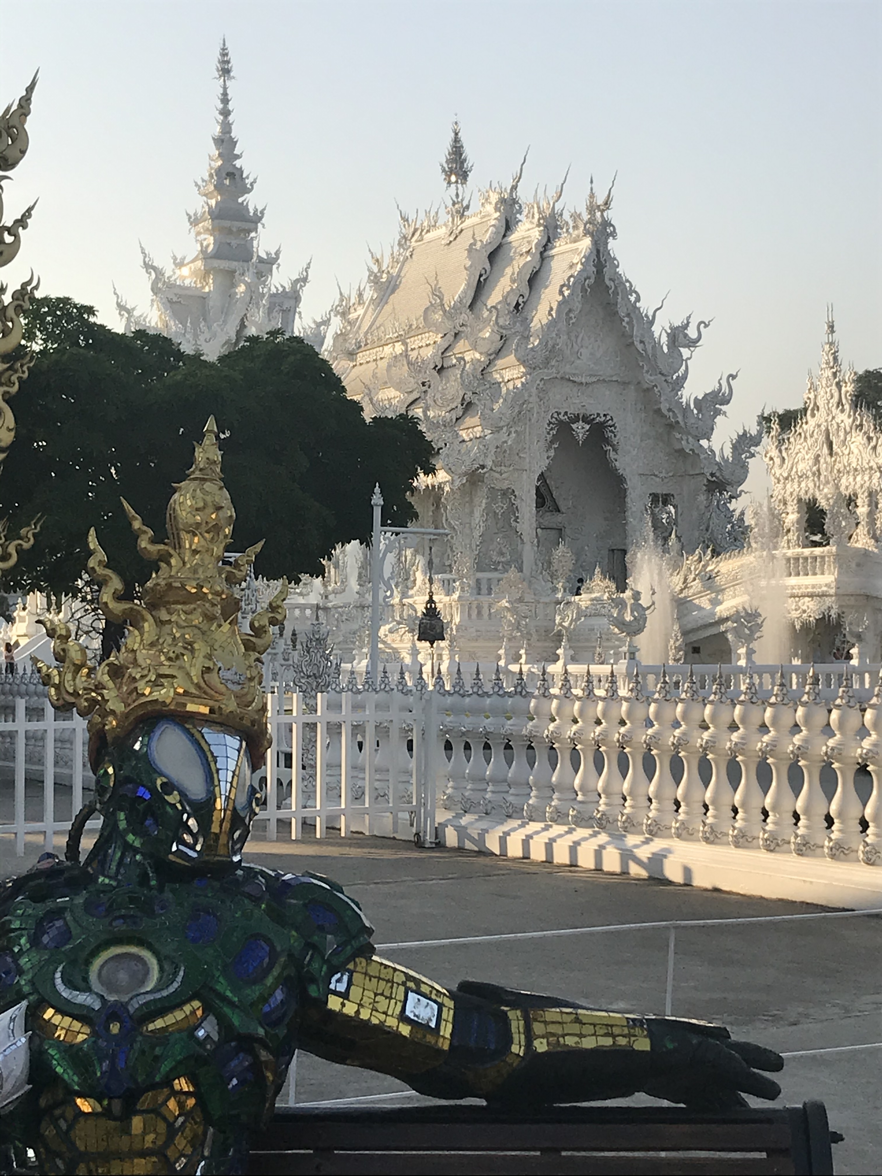 White temple structure with intricate designs.