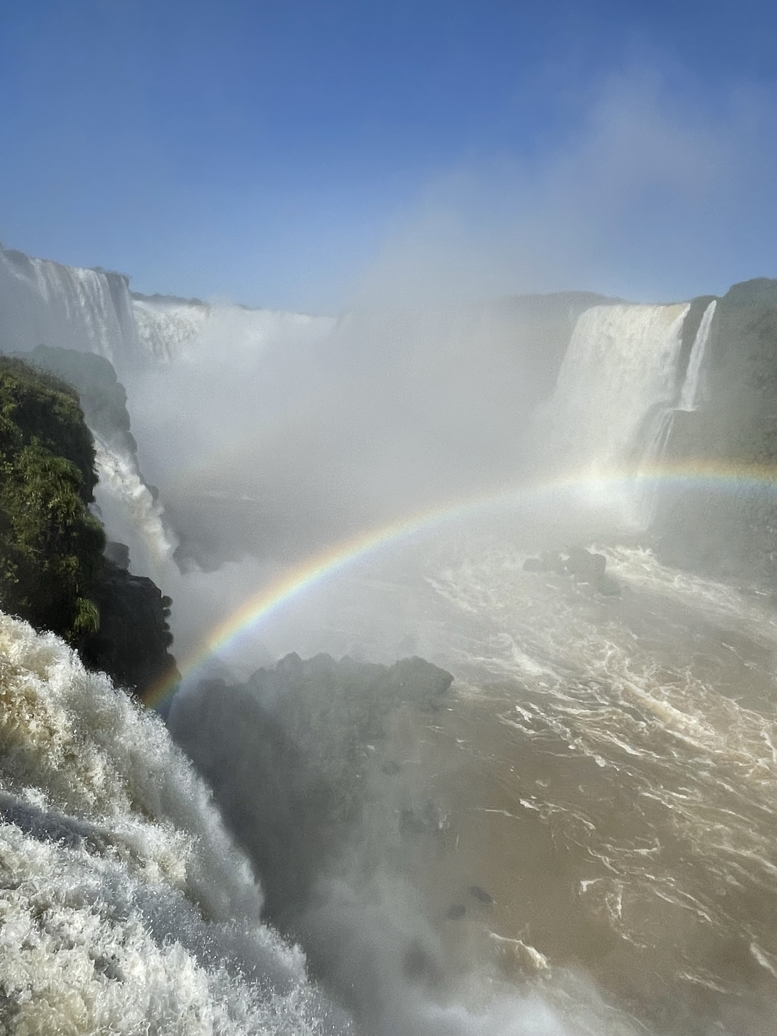 Beautiful rainbow over Iguazu Falls.