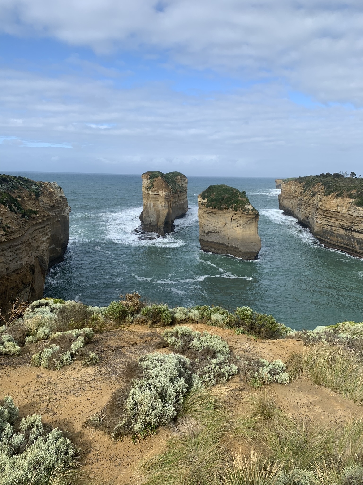 Beautiful coastal landscape with rock formations in the ocean.