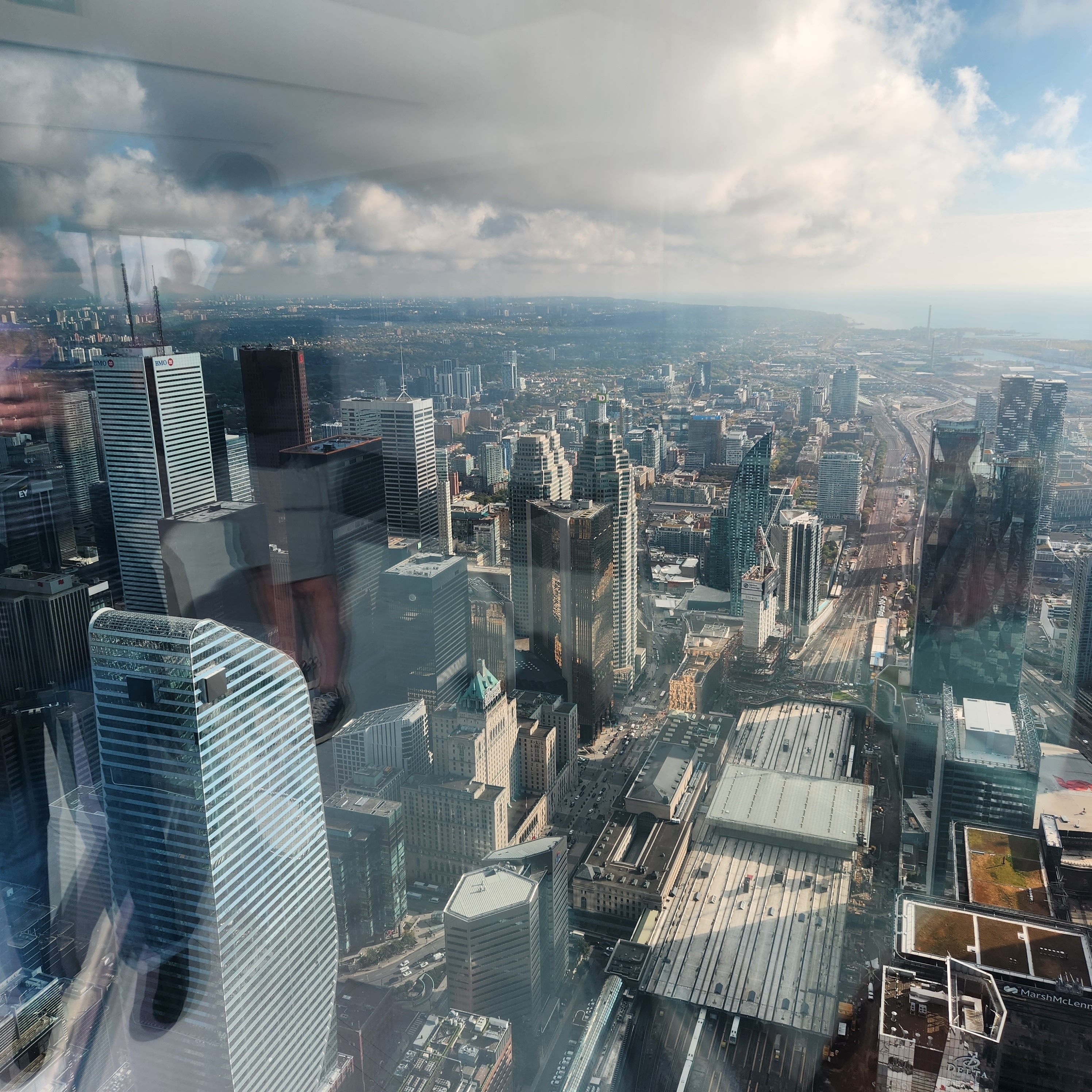 Aerial view of a bustling city with tall buildings.