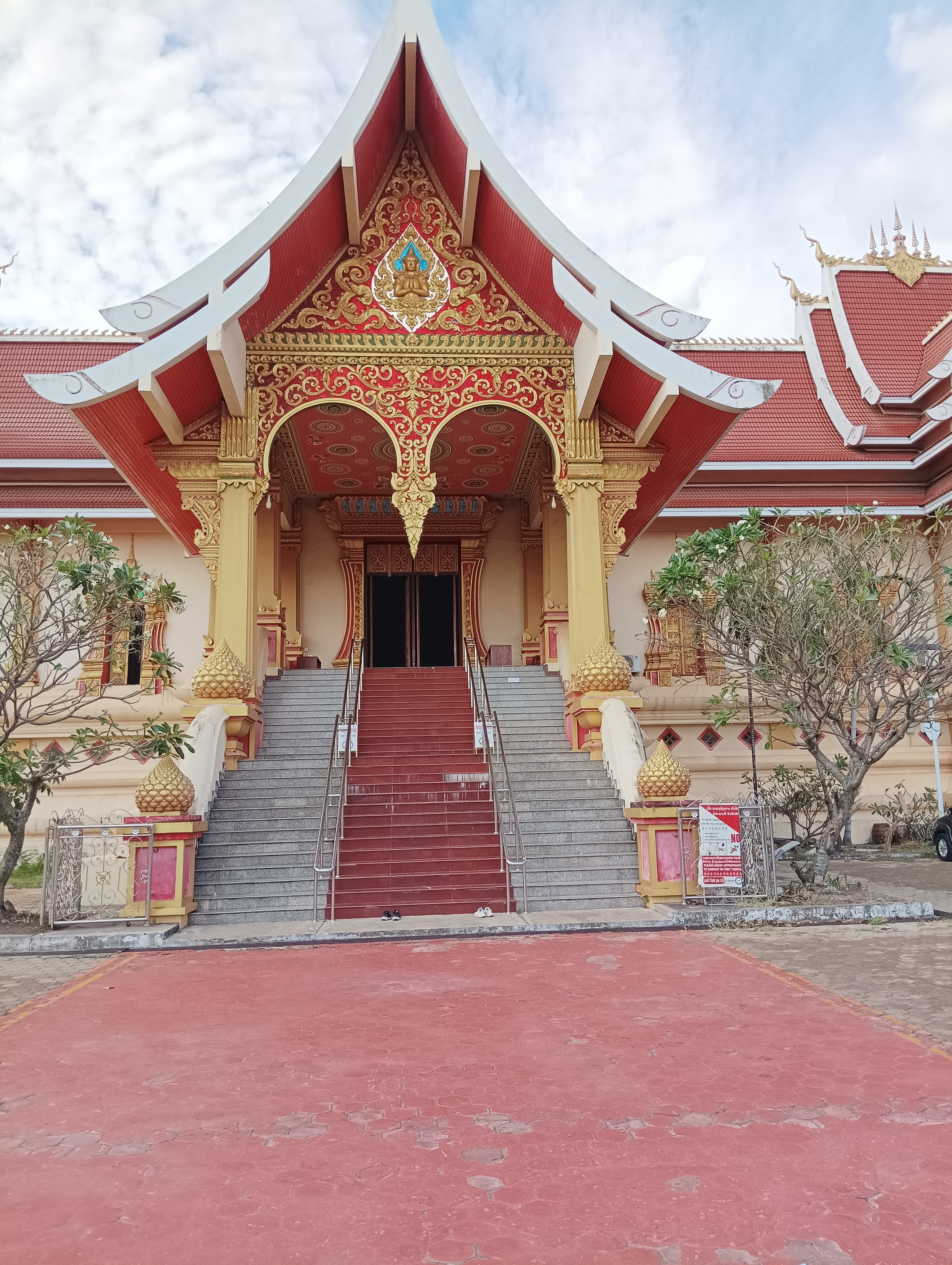 Steps leading to an ornately designed temple entrance.