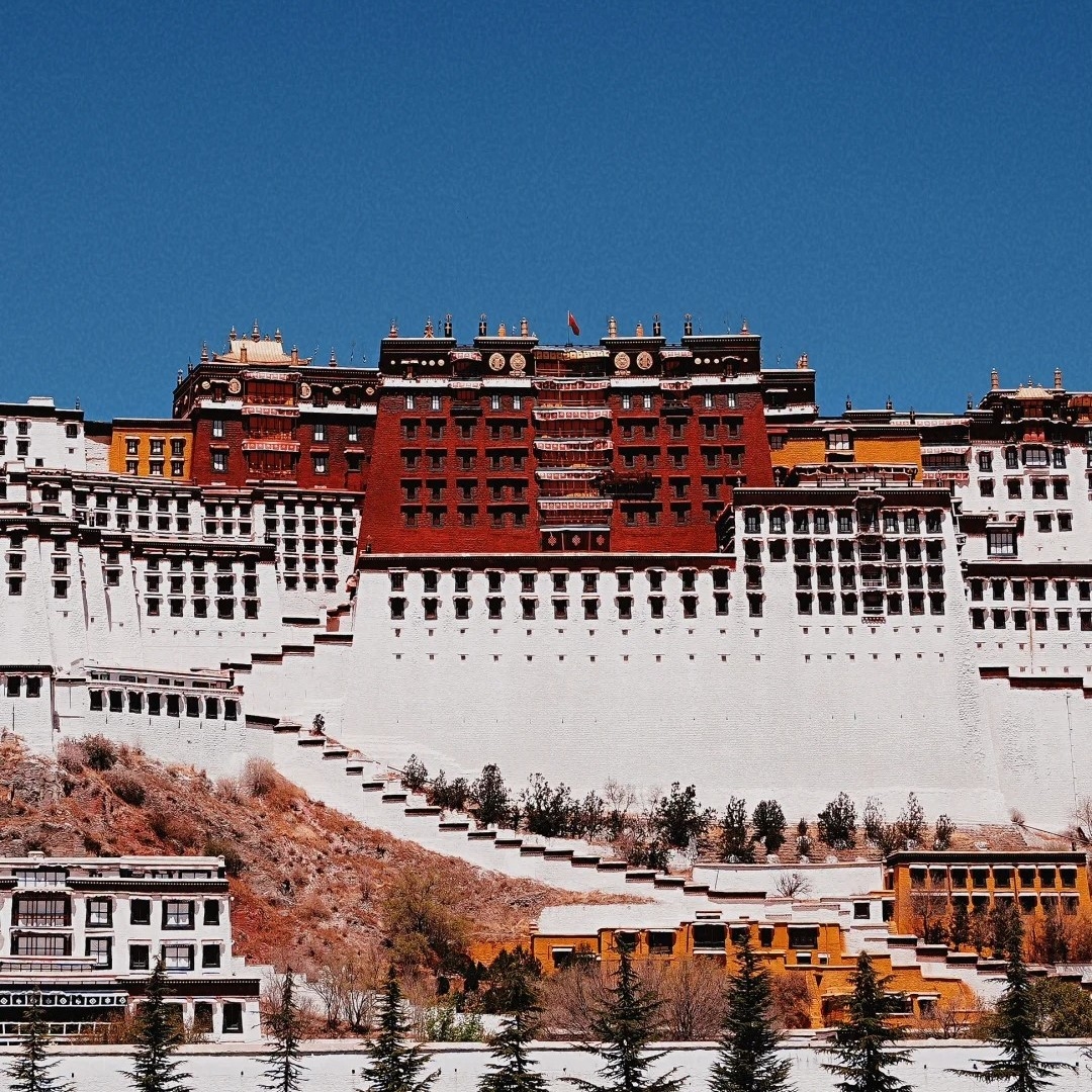 Potala Palace in Lhasa with a clear blue sky.