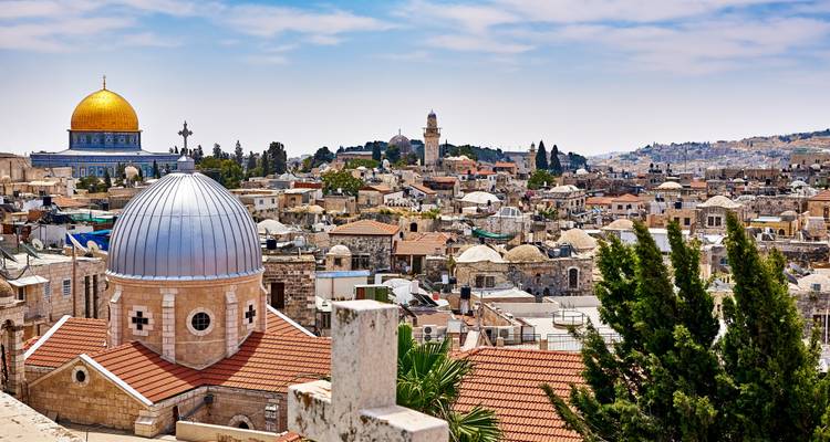 Skyline view of Jerusalem with the Dome of the Rock and Church domes.