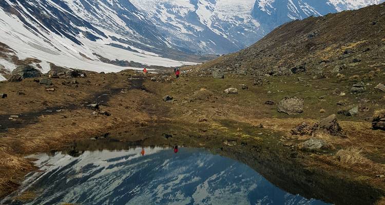 Mountain landscape with a reflection in a pond.