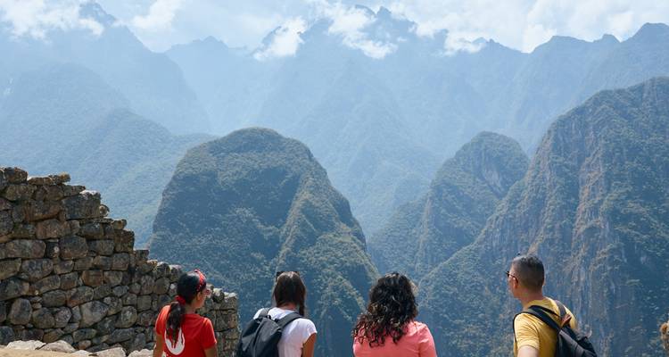 People enjoying a view of the Andean mountains.