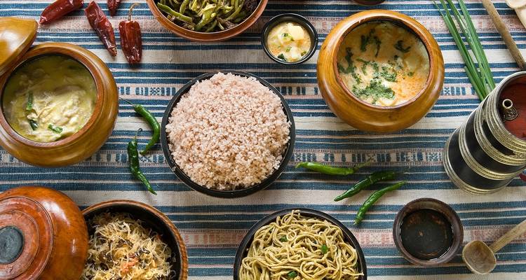 Traditional Bhutanese food spread on a table.