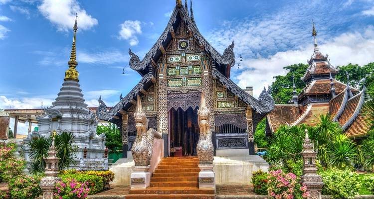 ornate Buddhist temple complex with golden details.