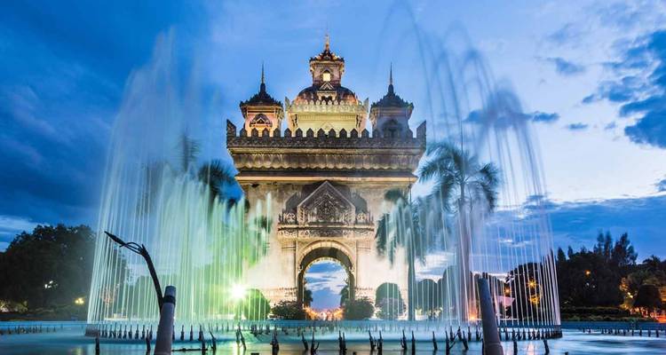 The Patuxai Victory Monument with fountains in Vientiane.