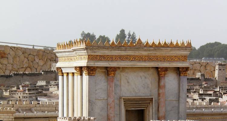 Scale model of an ancient temple with intricate details.