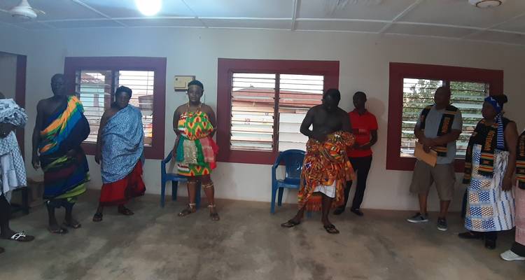Cultural gathering inside a room.