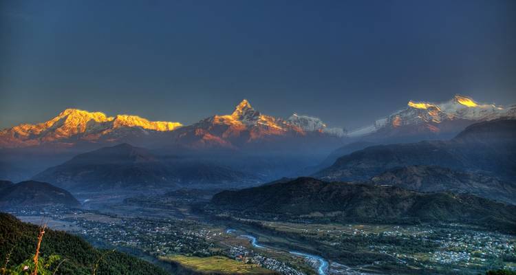 Dramatic sunrise over mountain range.