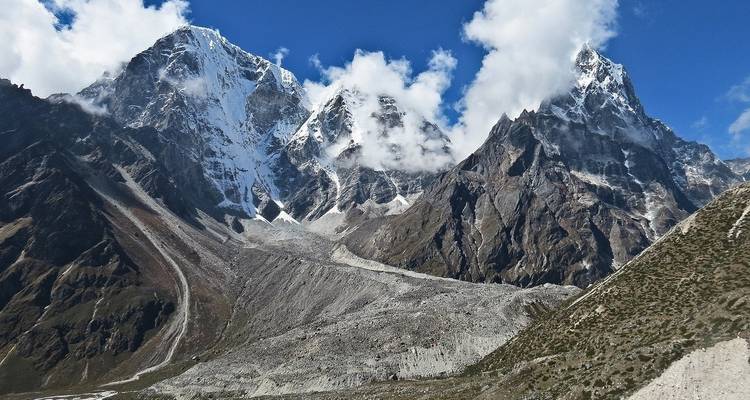 Snow-capped mountains under a clear blue sky.