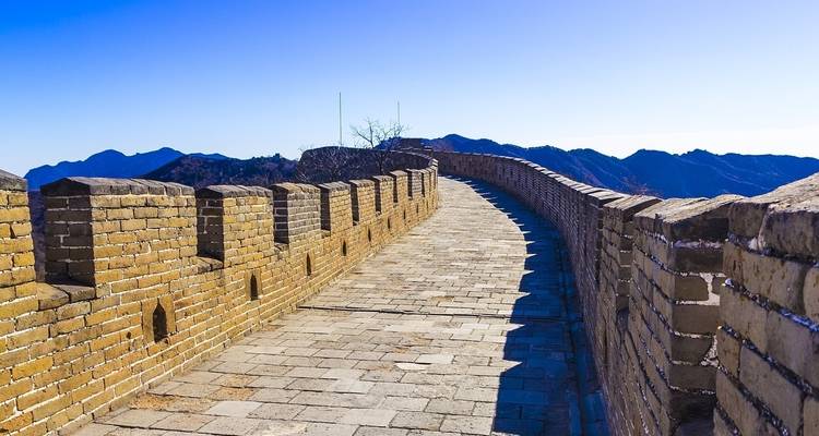 Great Wall of China under a clear blue sky.
