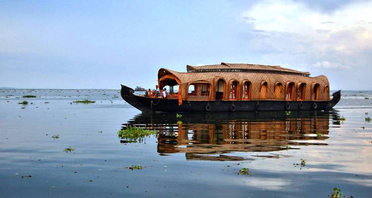Houseboat on tranquil waters.
